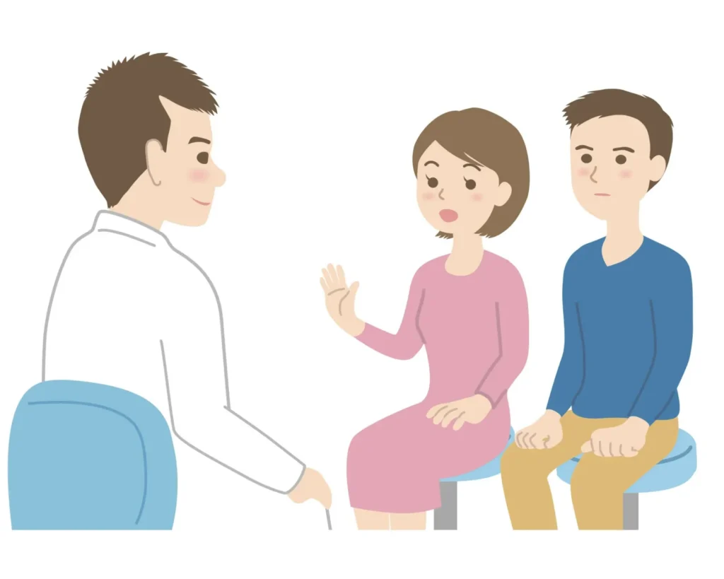 説明する医師
