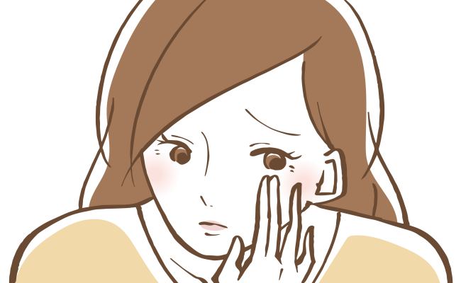 目元を気にする女性のイメージ